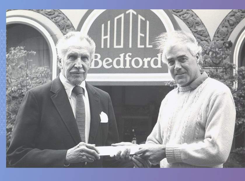 Bill Kimpton (R) with actor Vincent Price in front of the Hotel Bedford, the company's first property.&amp;nbsp;