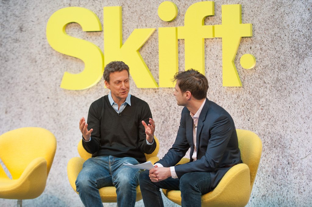 Momondo Group CEO Hugo Burge speaking at Skift Forum Europe in London in April 2017.