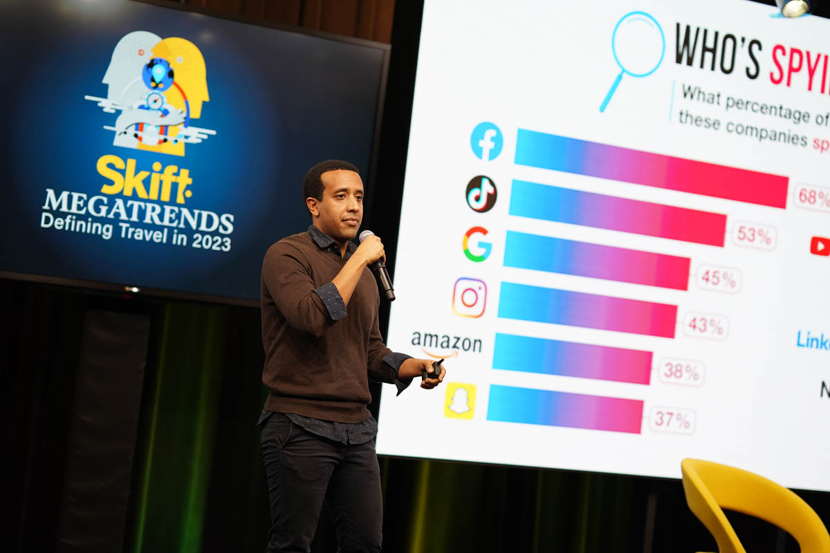 Dawit Habtermanian speaking on stage