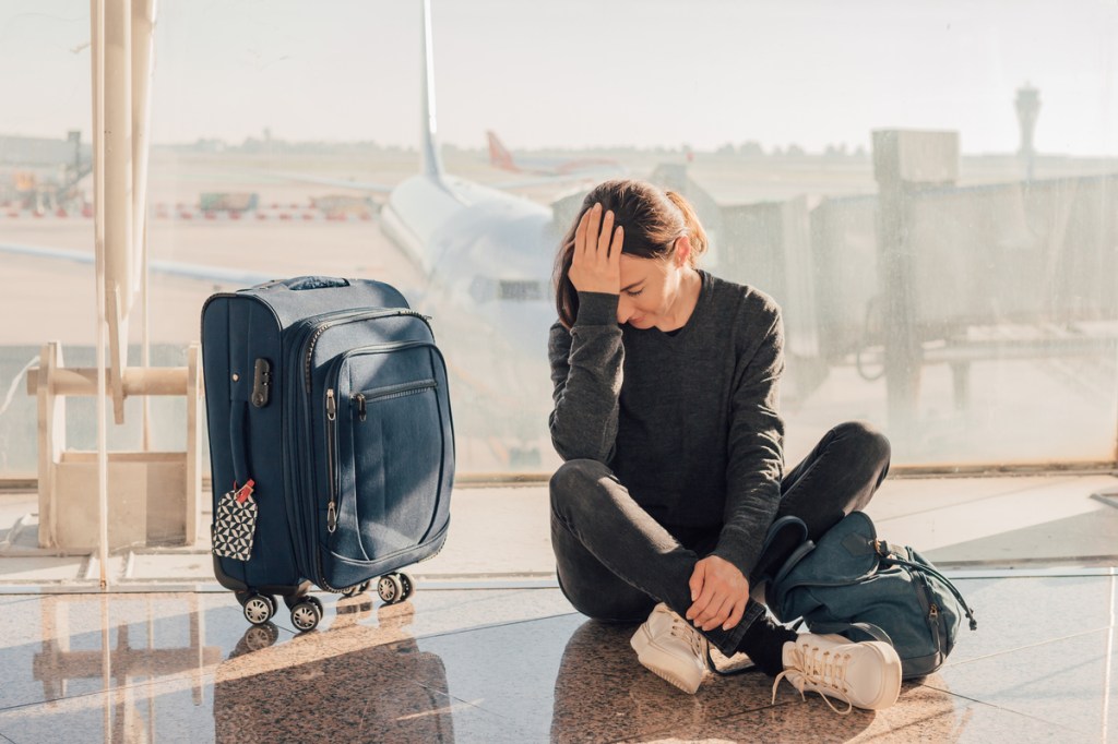 Frustrated woman at airport