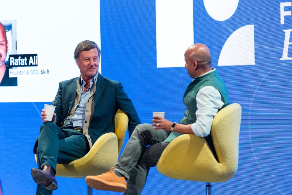 executives talking on a stage