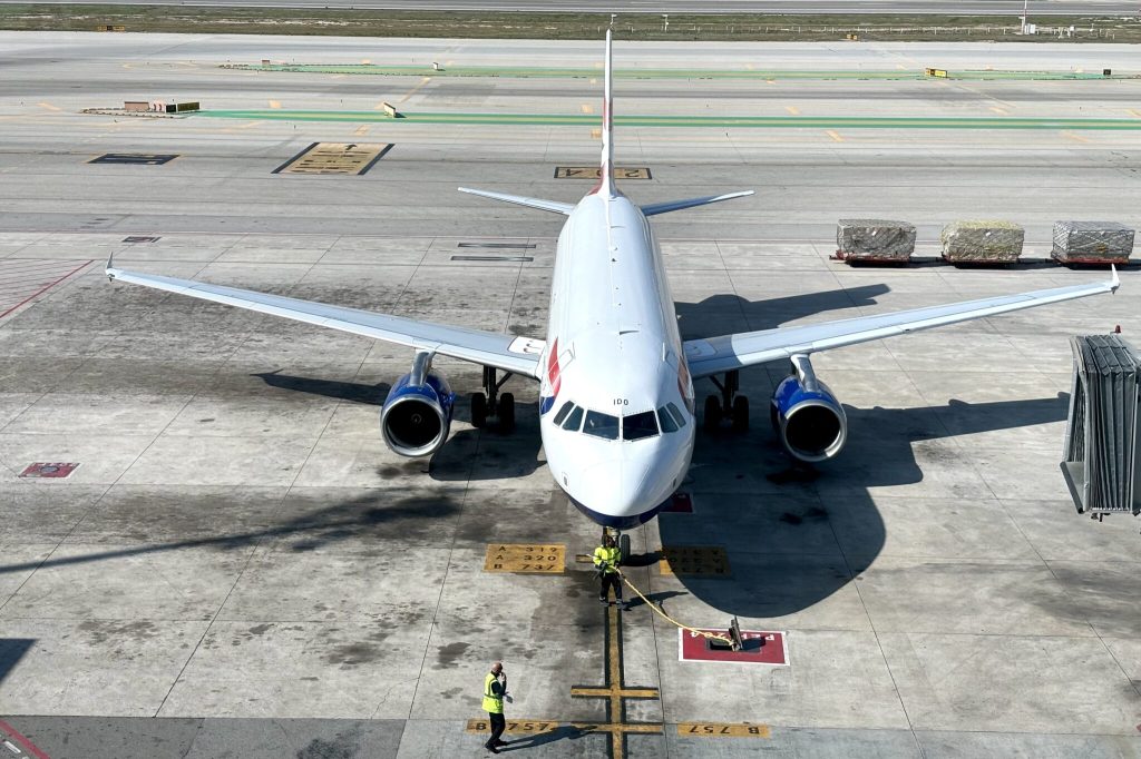 Front view of an airplane on a tarmac