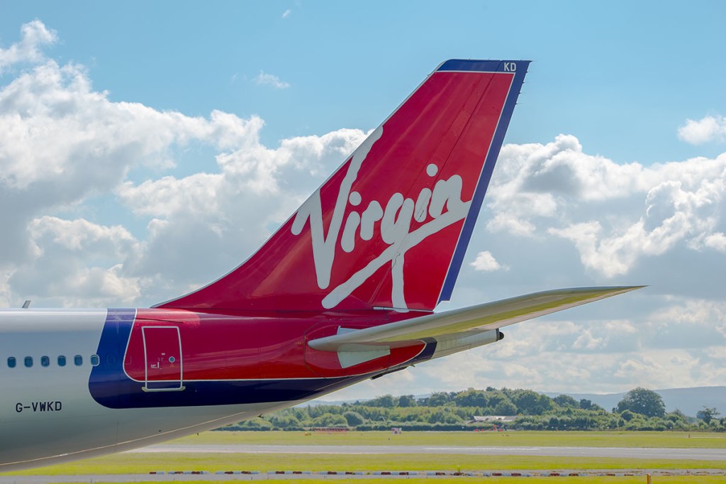 Tail and wings of a Virgin Atlantic aircraft