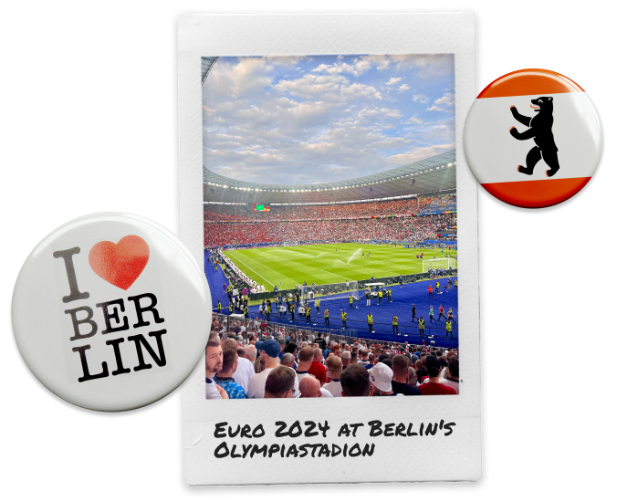 Polaroid image of football stadium during 2024 Euros Finals at Berlin Olympiastadion with two pin badges either side