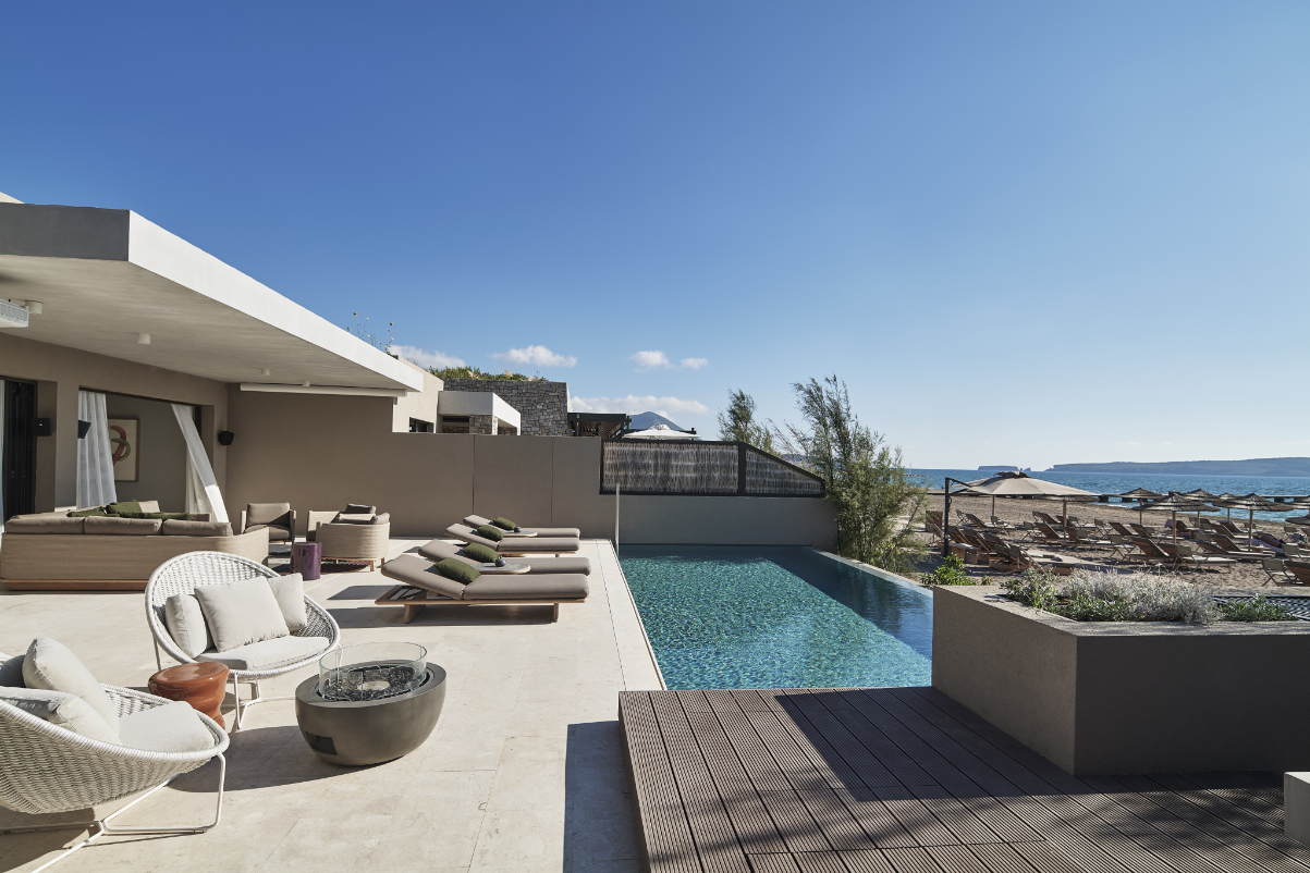 a pool deck at a fancy hotel