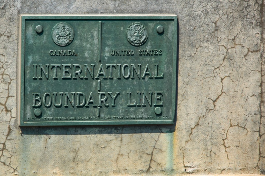 Brass plaque between New York State and Ontario.