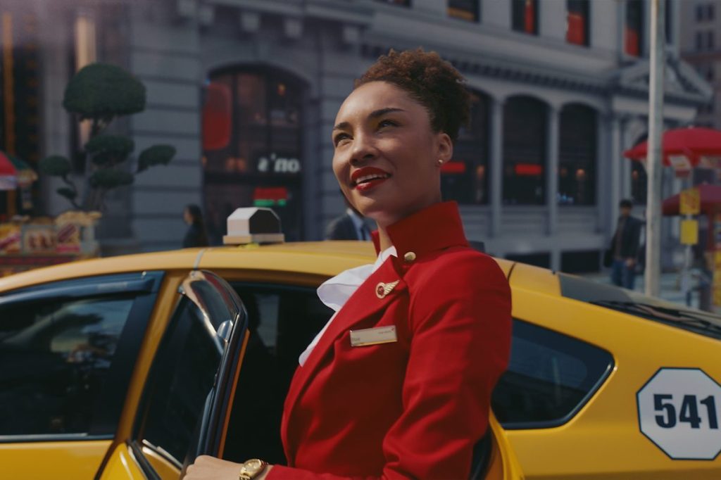 A still from the Virgin Atlantic 2025 ad showing a crew member in New York