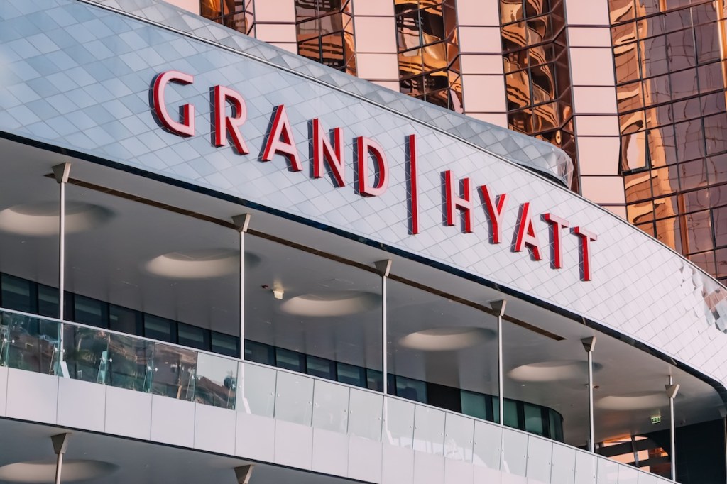 Grand Hyatt hotel signage on a building exterior.