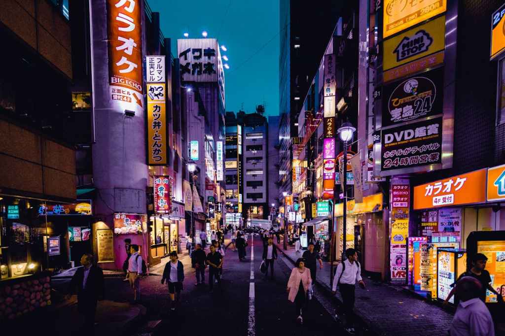 People walking in the streets of Shinjuku City in Tokyo, Japan.