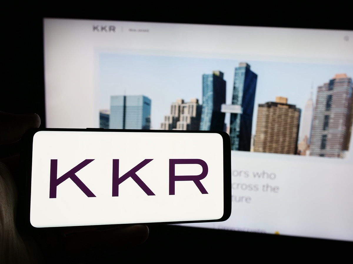 A smartphone with the Kkr logo