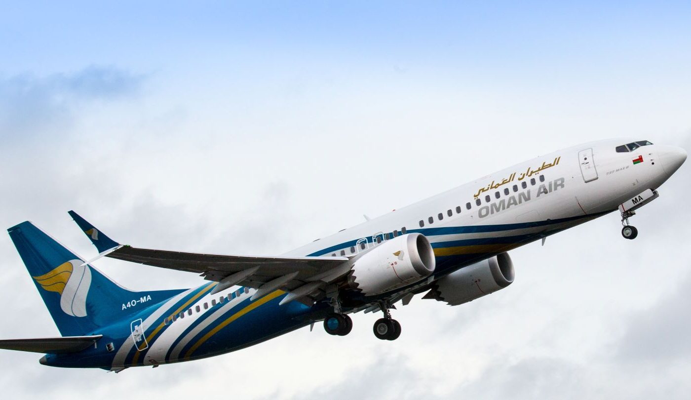 An Oman Air Boeing 737 Max plane in flight.