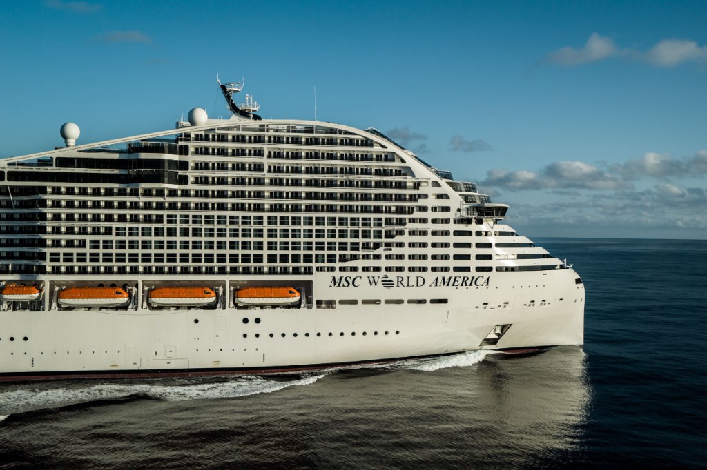 aerial view of MSC World America a new cruise ship at sea on a sunny day