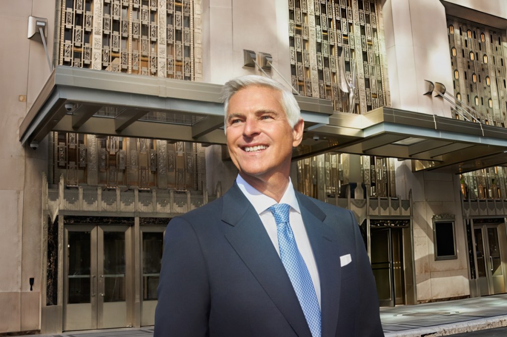 photo of ceo of hilton standing outside