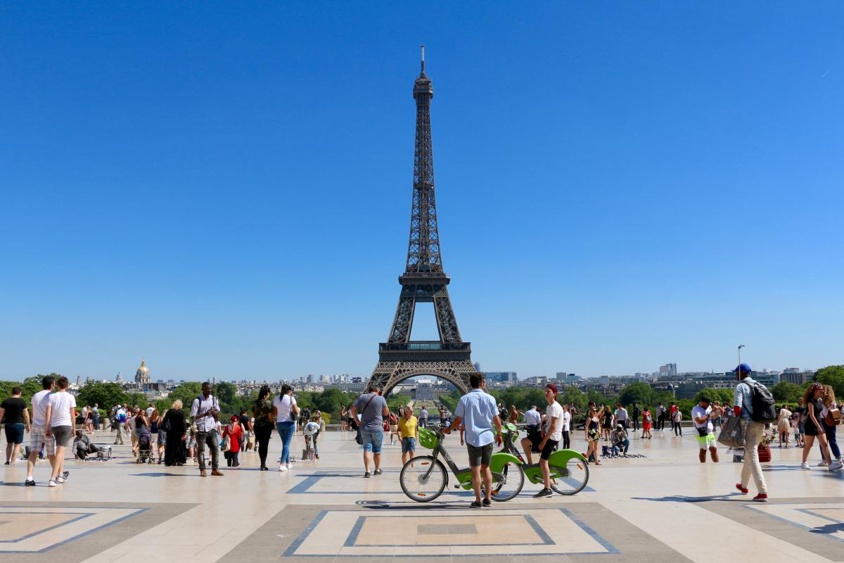 A view of the Eiffel Tower in Paris on a sunny day.