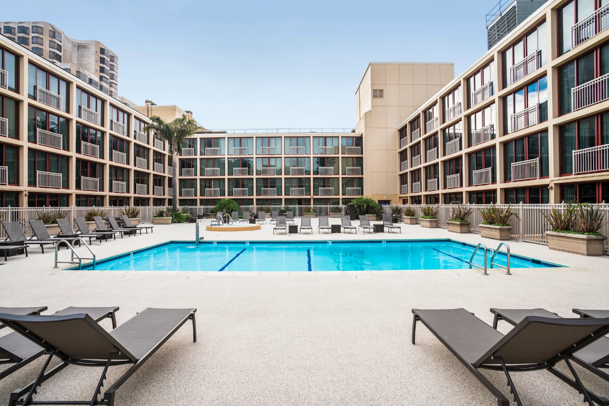 view of a swimming pool outdoors from a pool deck at the Hilton San Francisco Union Square