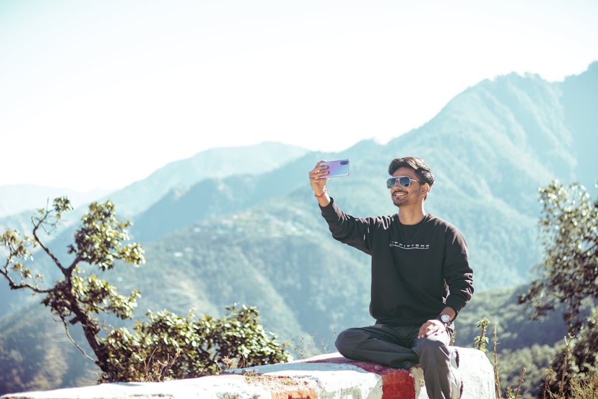 An Indian traveler clicking pictures.
