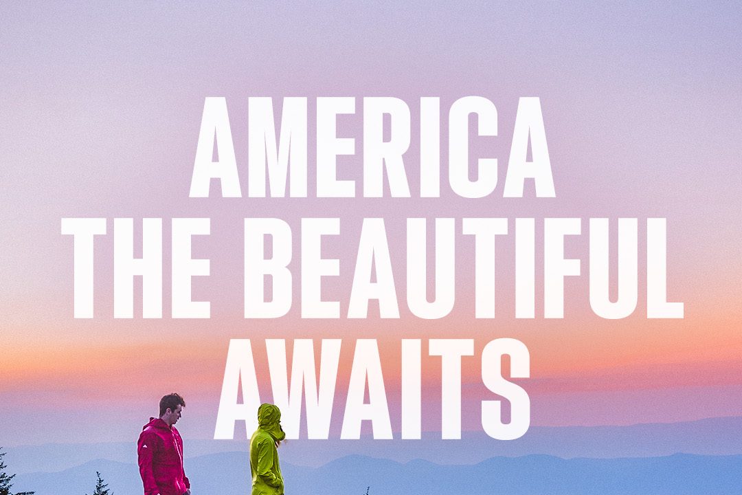 An image from Brand USA's America the Beautiful campaign features two people hiking below text reading "America the Beautiful Awaits."