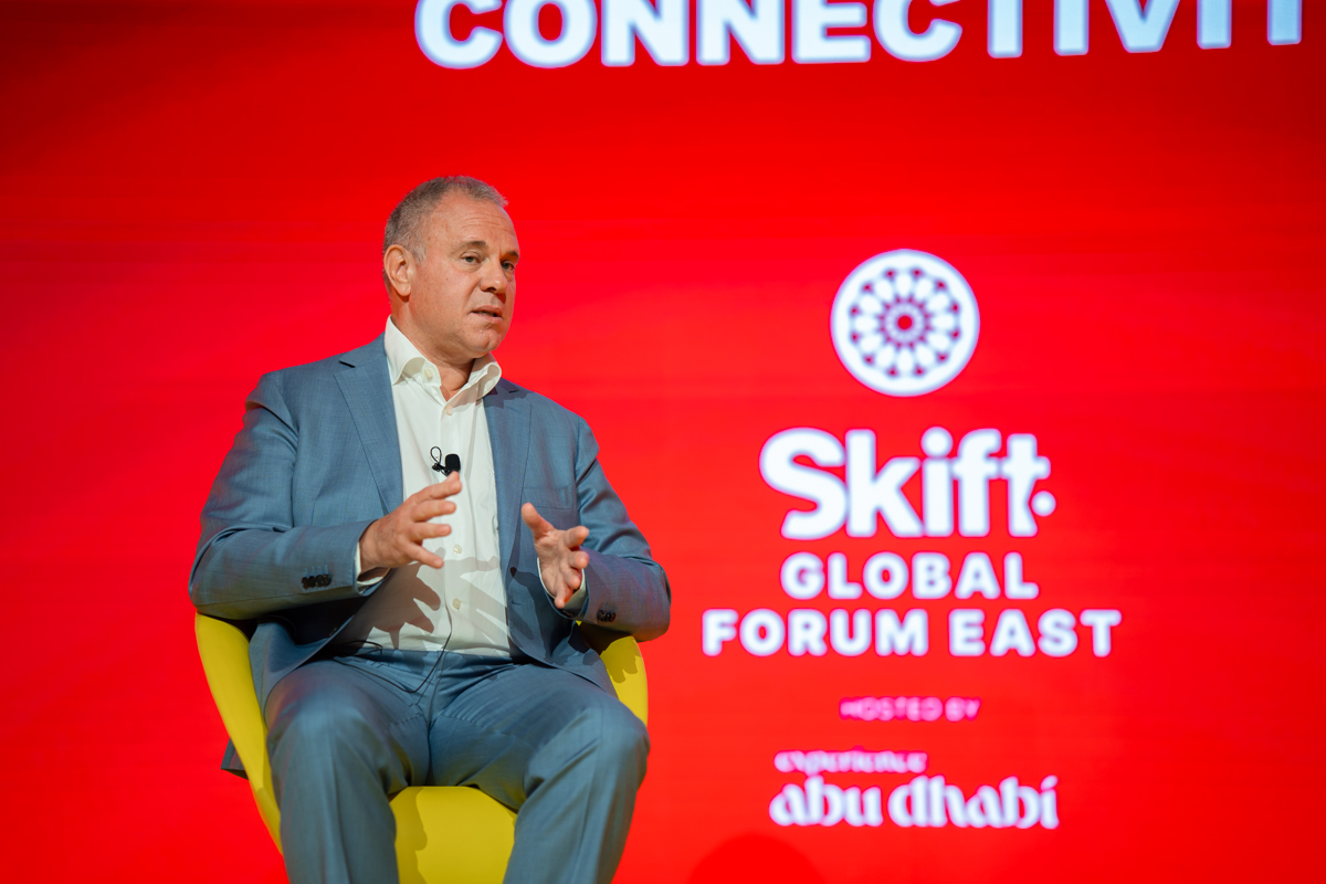 a man speaking on stage
