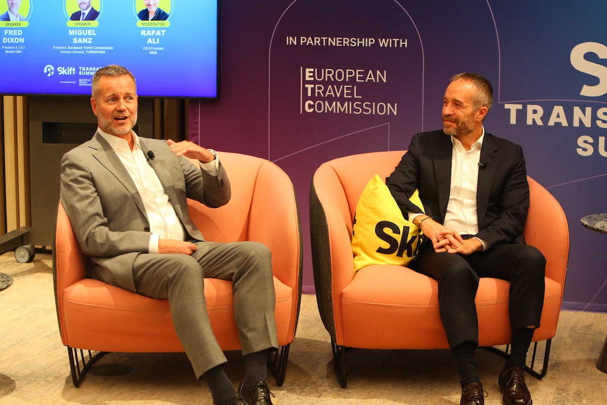 Fred Dixon, CEO of Brand USA, speaks while sitting next to Miguel Sanz, president of the European Travel Commission and general director of the Spanish Tourism Institute (TURESPAÑA), at the 2025 Skift Transatlantic Summit.