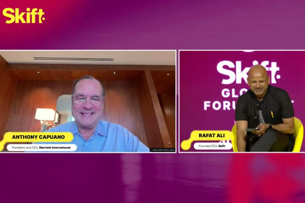 a screenshot of the CEO of Marriott International Anthony Capuano talking remotely with the CEO of Skift at a conference in Abu Dhabi