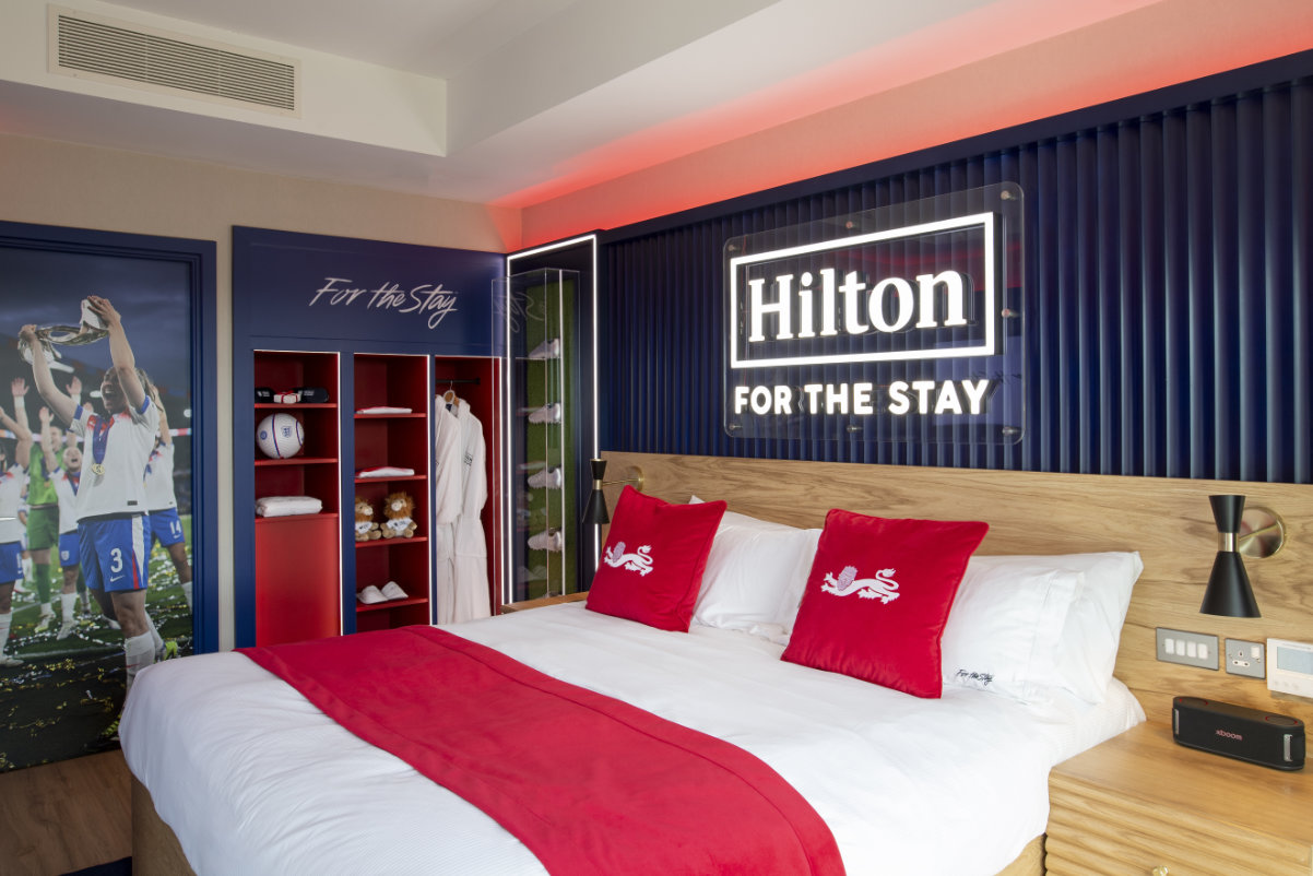 a guest room at Hilton at St George's Park Hotel with decor for the England football team