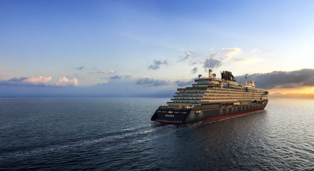 aerial view of the tail end of a luxury cruise ship at sunset.