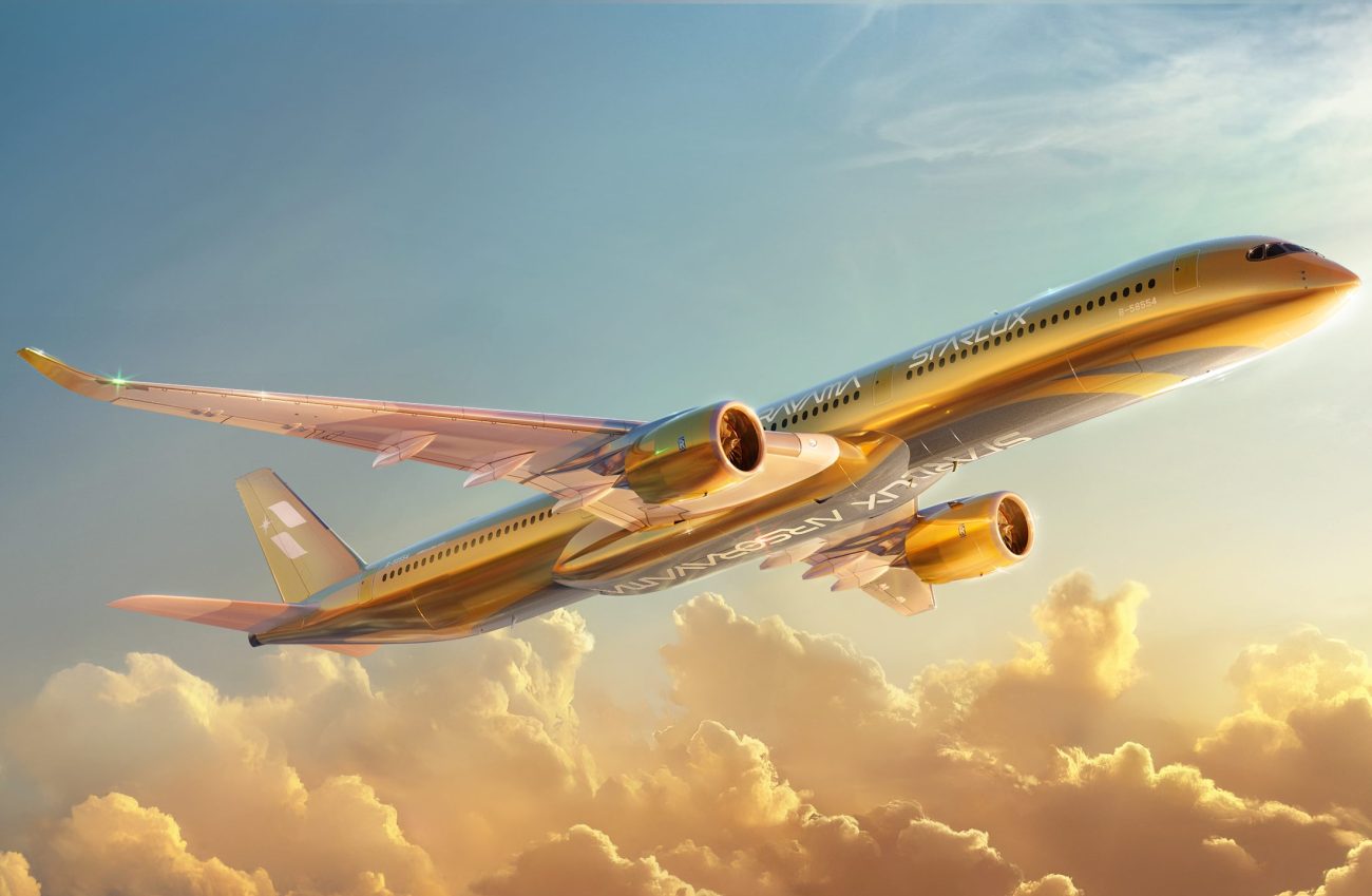 Starlux Airlines' Airbus A350 in a golden livery.