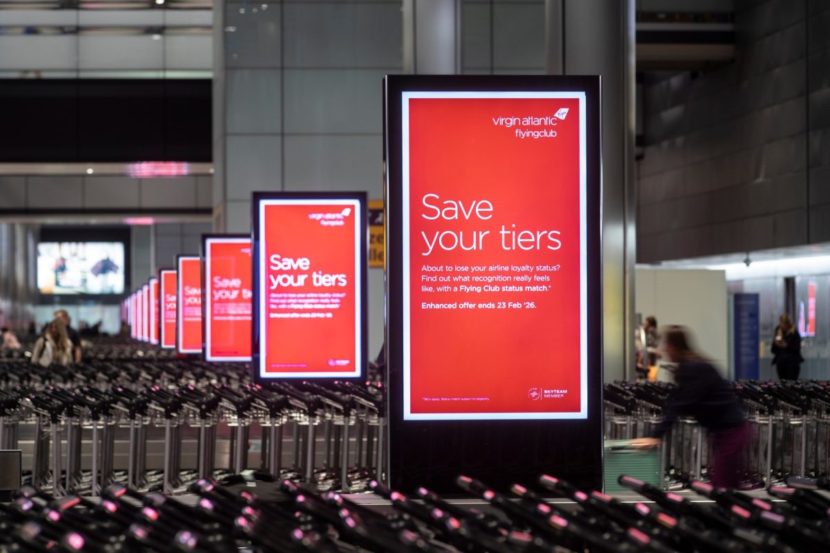 Advertising for Virgin Atlantic's loyalty match campaign at Heathrow.