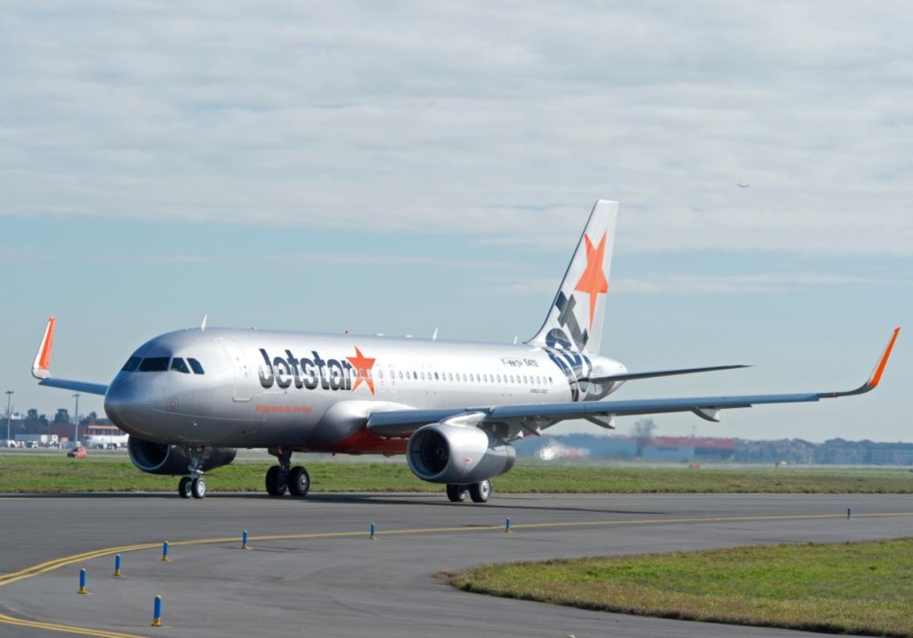 A Jetstar Japan taxiing at the airport