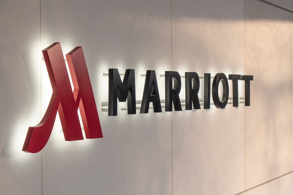 a sign reading Marriott on an exterior wall.