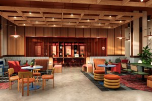 A rendering of a warm tones, modern furniture hotel that charges about $130 a night in small college towns under the brand Undergraduate by Hilton.